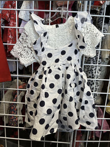 white dress with blue polka dots